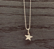 Silver hammered star