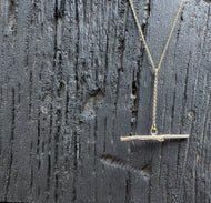 Gold twig T bar necklace