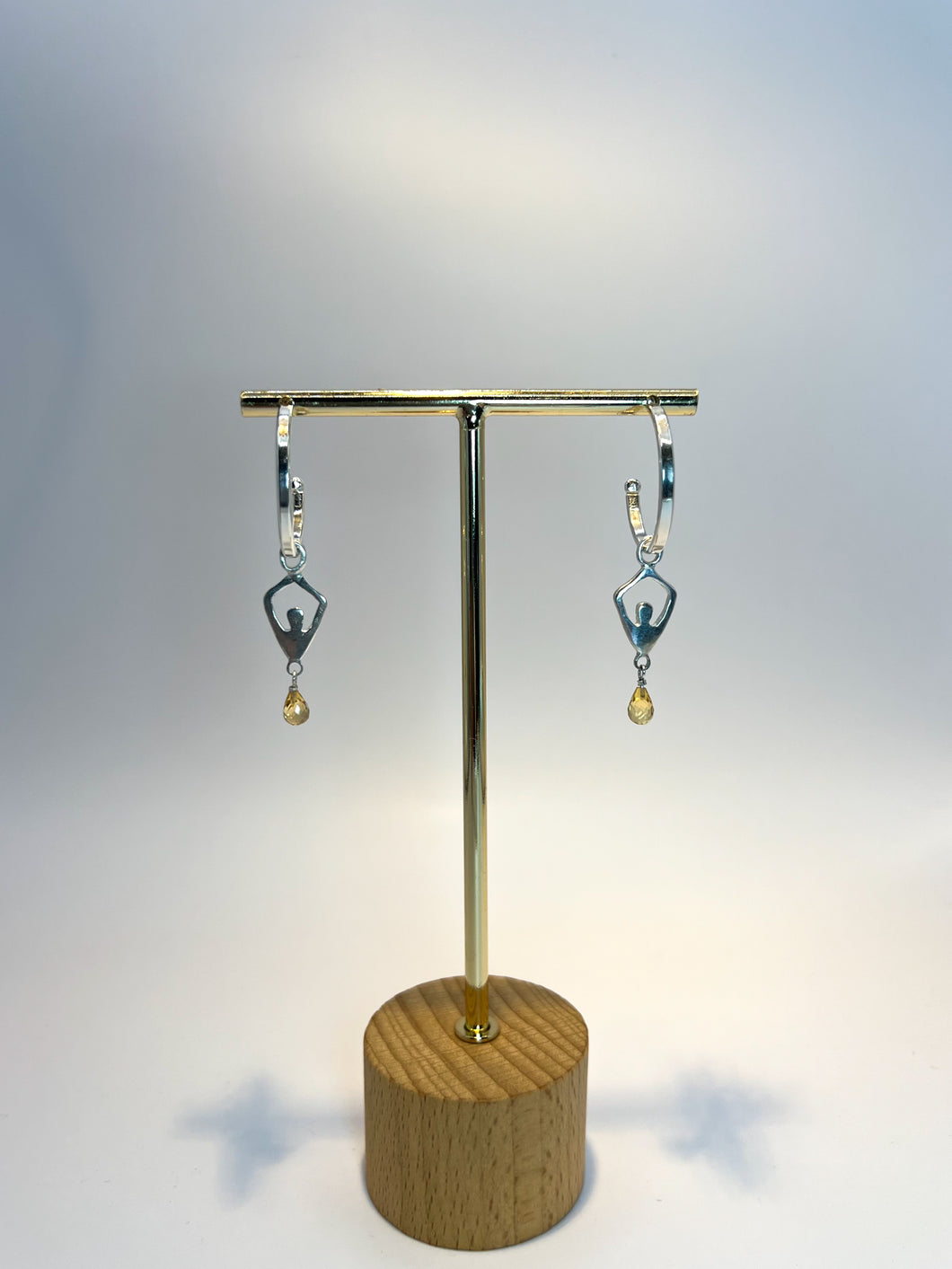 Sterling silver hand forged citrine hoops.