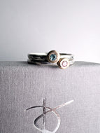 Silver and gold stone set stackers.